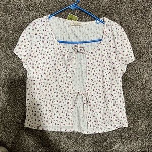 Top ties in the front never worn tags still on